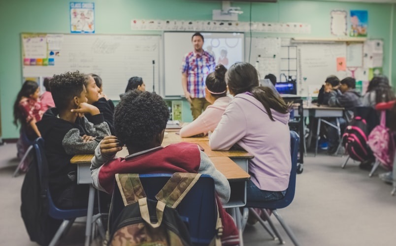 Student Sitting in Classroom